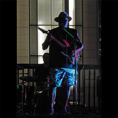 BACKLIT BLUES (Rocking out on a rooftop in Austin, TX)