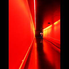 RED CORRIDOR (Wonderful lines and shadows in a hallway at Cape Kennedy Space Center, Florida)