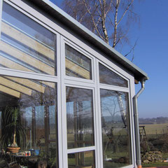 Wintergarten aus Holz-Aluminium (Privathaus in der Eifel)