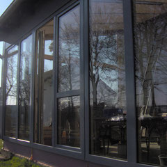 Wintergarten aus Holz-Aluminium (Privathaus in der Eifel)