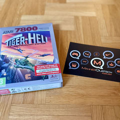 Das Bild zu Männerquatsch Podcast Folge 201 zeigt das Spiel Tiger Heli für den Atari 7800.