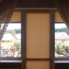 Рулонні штори на скошені вікна