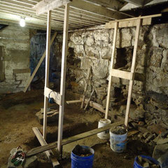 Formwork for construction of buttresses to stabilize leaning 1880-era bank barn foundation wall; private client, Mantua, Ohio.