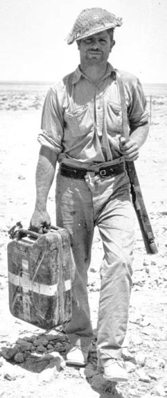 A Tommy with a captured German 20 Litre water Jerrycan.