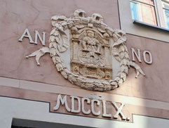 Moulding on an Old Riga house with the logo of the Glassmakers' Guild and the date 1760 in Roman numerals