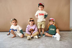 4 Kinder mit verschiedenen Pullover