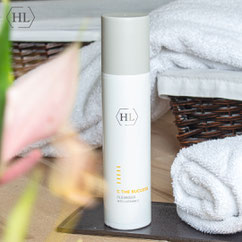 Produktbild eines sanften Gesichtsreinigers mit Vitamin C – HL C The Success Cleanser. Weiße Flasche mit orangefarbenem Akzent, auf hellem Hintergrund platziert.