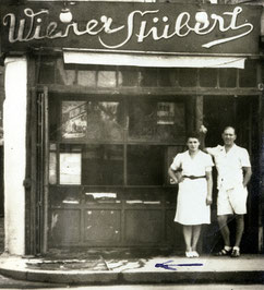 Austrian Jewish Refugees Fraziska and Leopold Brodmann in front of their Wiener Stüberl Cafe in Shanghai, No 32 Ward (Changyang Rd.). Picture source: Die Presse (https://www.pressreader.com/austria/die-presse/20201028/282037624662795)