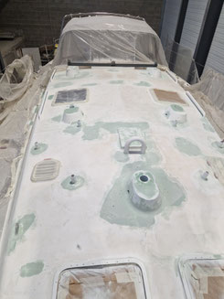 Sanding/micro-sandblasting of areas to be treated, application of epoxy undercoat, coating, sanding