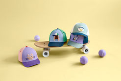 Kollektion Basecap Kinder von LÄSSIG mit Skateboard & Tennisbällen