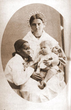 1880 Erminia Baglione , moglie di Giacinto de Mitri con la piccola Maria ed il valletto di casa " Morin Moretto ".