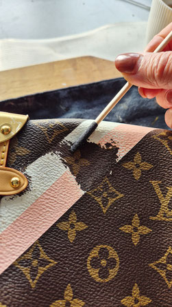 waar lv tas laten maken, verfbeschadiging