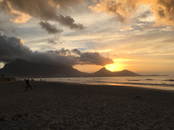 An image showing the sun setting over signal point in cape town