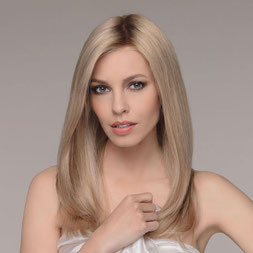 Une perruque en cheveux naturels clearance