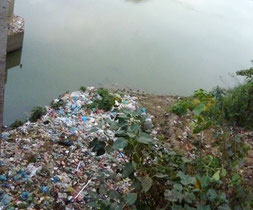 Small river in Yangon, carrying all kind of garbage.