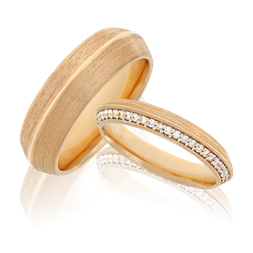 Trauringe in Rotgold mit Brillanten aus der Ehering Kollektion Trinity der Goldschmiede OBSESSION Zürich und Wetzikon.