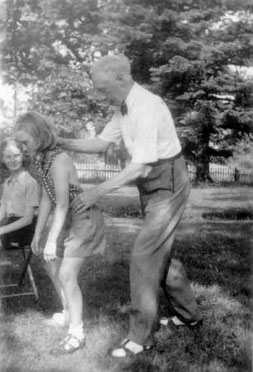 F.M.Alexander demonstrating the Monkey position to a pupil whilst in a lunge.