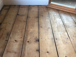 Floor boards hidden under the carpet