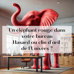 Un éléphant rouge au millieu d'un bureau pour symboliser le hasard