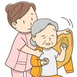 座って着替え介助を受ける高齢者のイメージ