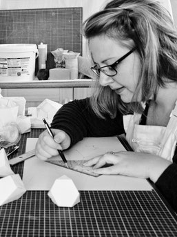 Photography and Concrete Artist PASiNGA Pictured With Her Work