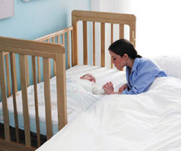 Bedside cot, easier for night feeds, and with an adjustable height base it can be used as a cot in the babies nursery!