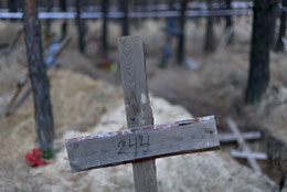 JB Russell, A mass grave found in liberated Kharkiv Oblast, Izium, Ukraine. October 2022