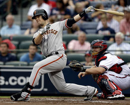 Nella foto Buster Posey (By Chris Saur)