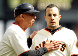 Nella foto il coach Tim Flannery da indicazioni a Andres Torres (Ezra Shaw/Getty Images North America)