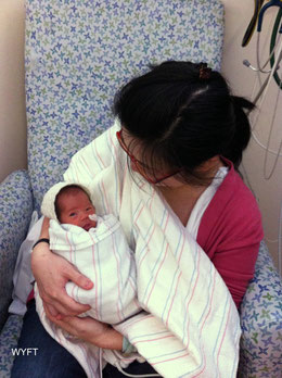 With my baby at 2 weeks old. Photo Credit: Grace
