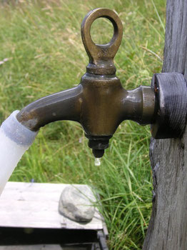 water tap, a well in the Alps