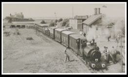 Talyllyn Railway: A train just leaving Towyn Wharf station.