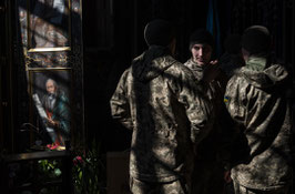 JB Russell, Soldiers during a funeral at the Saints Peter and Paul Greek Catholic garrison church, Lviv, Ukraine. March 2022