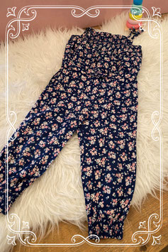 Super leuke gebloemde jumpsuit - Maat 86
