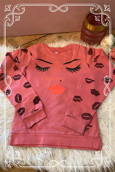 Roze trui met gezicht - Maat 134/140