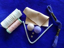 Materiaalpakket voor een lentehanger met tricothoofdje