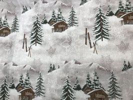 Schöner Stoff mit Wintermotiv Ski und Chalet in den Bergen
