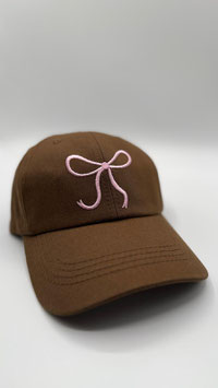 Kappe mit rosa Schleife