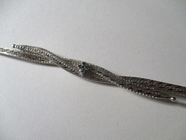 Silver bracelet 70's style with small light blue topaz