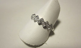 White gold ring with zircons