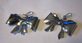 Silver earrings bow pendant shape