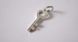 Silver key with zircons