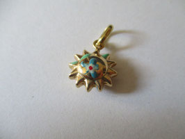 Sun in enamelled gold