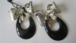 Silver earrings and black resin