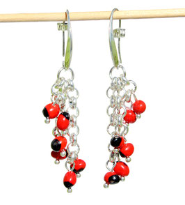 Boucles d'oreilles huayruro cadena