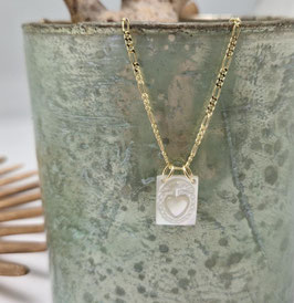 Hanger groot parelmoer sacred heart met 14 krt gouden ogen