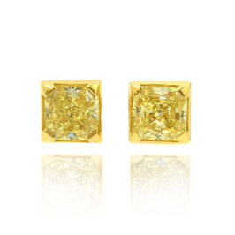 0.58 Carat, Fancy Yellow Radiant Diamond Stud Earrings total weight 0.58ct set in 18K Gold, Radiant, VS2