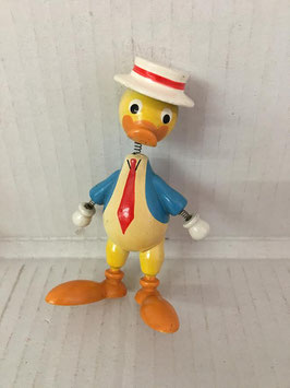 figura de muelles ( pato con gorro )