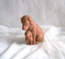 Hund mit Welpe klein
