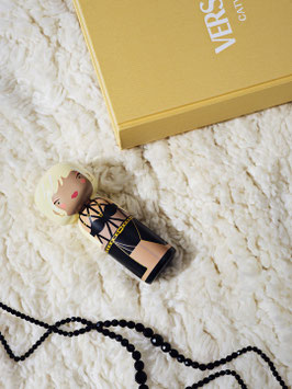 LUCIE KAAS. KOKESHI . DONATELLA VERSACE